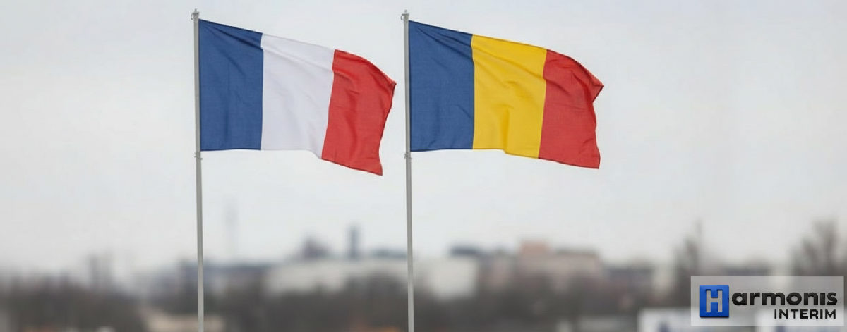 quelles obligations légales détachement roumain france - Chantier avec drapeaux roumain et français, symboles légaux.